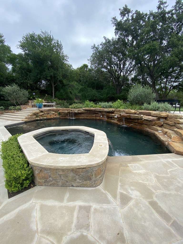 Pool and landscaped outdoor area at the Balcones residence