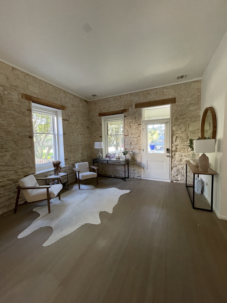 Sunlit stone-walled entry in an Austin residence