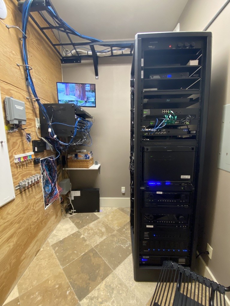 Equipment rack and wiring at the Balcones residence