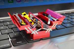 tools_tiny_toolbox_toolkit_on_laptop_keyboard_by_bet_noire_gettyimages_1200x800-100756958-large